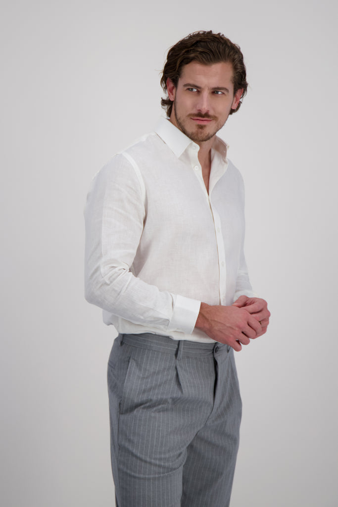 Akumal Ivory Linen Dress Shirt worn by model leaning sideways